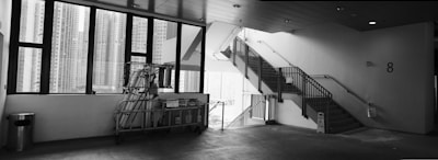 Photo of a professional cleaning team working on a modern office staircase