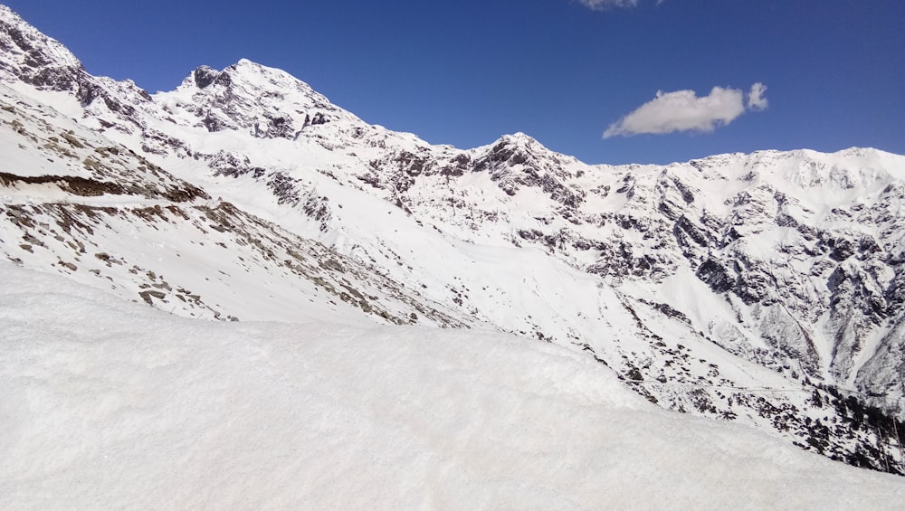 snow covered mountain under blue sky during daytime