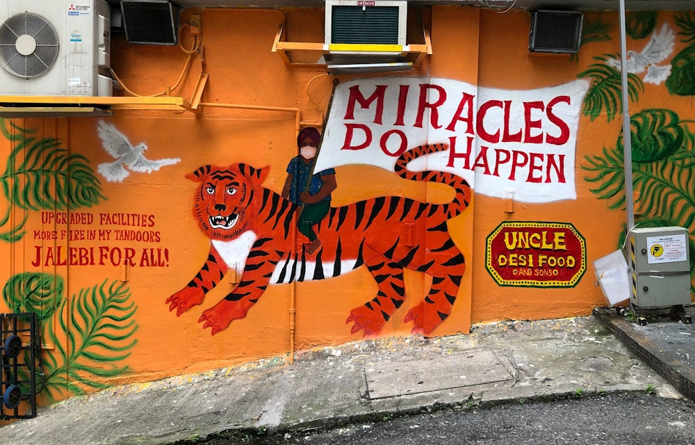 graffiti tigre arancioni e neri