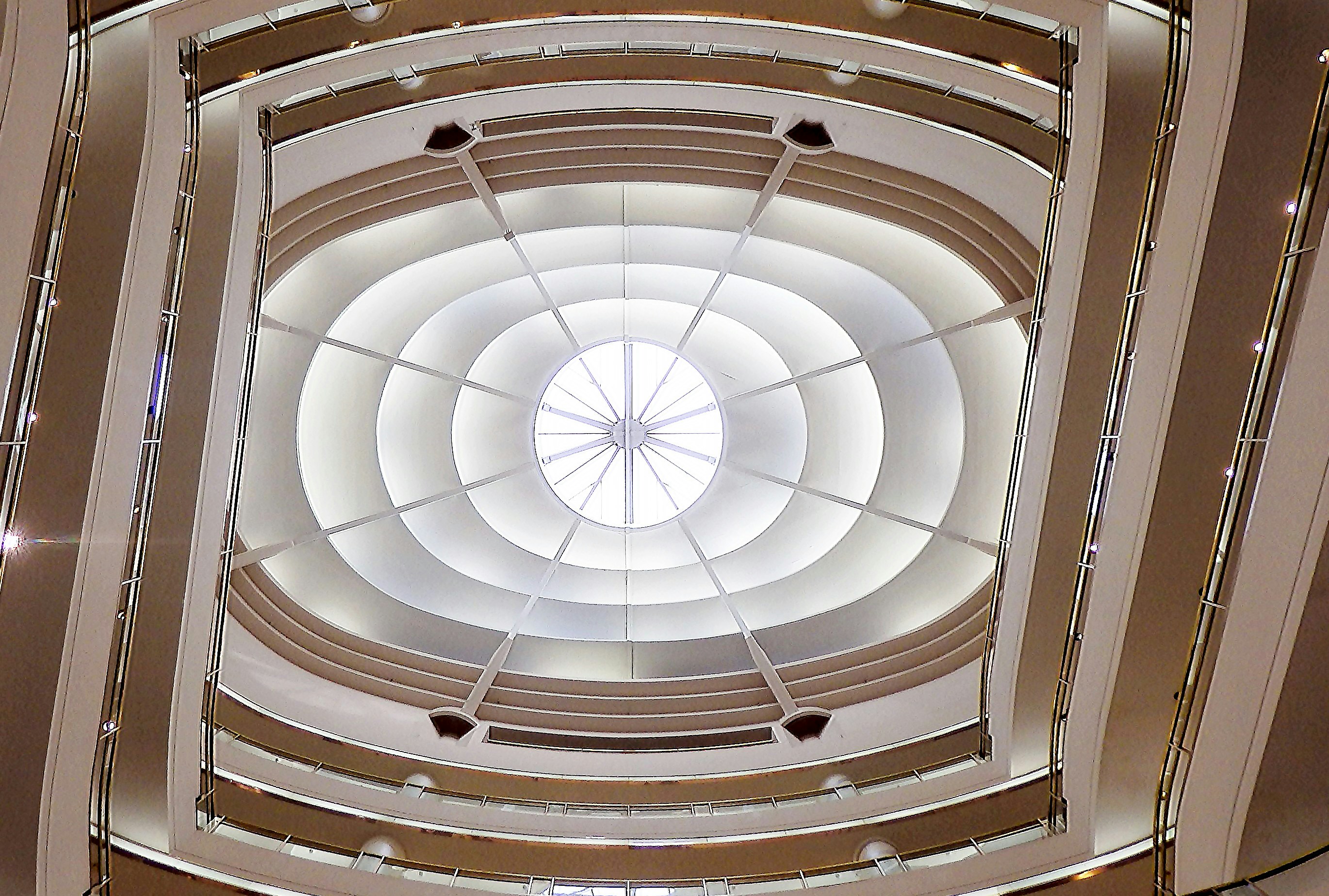 white and brown ceiling with white light
