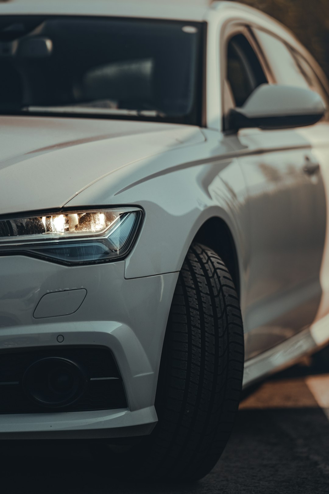 white car with white and black license plate