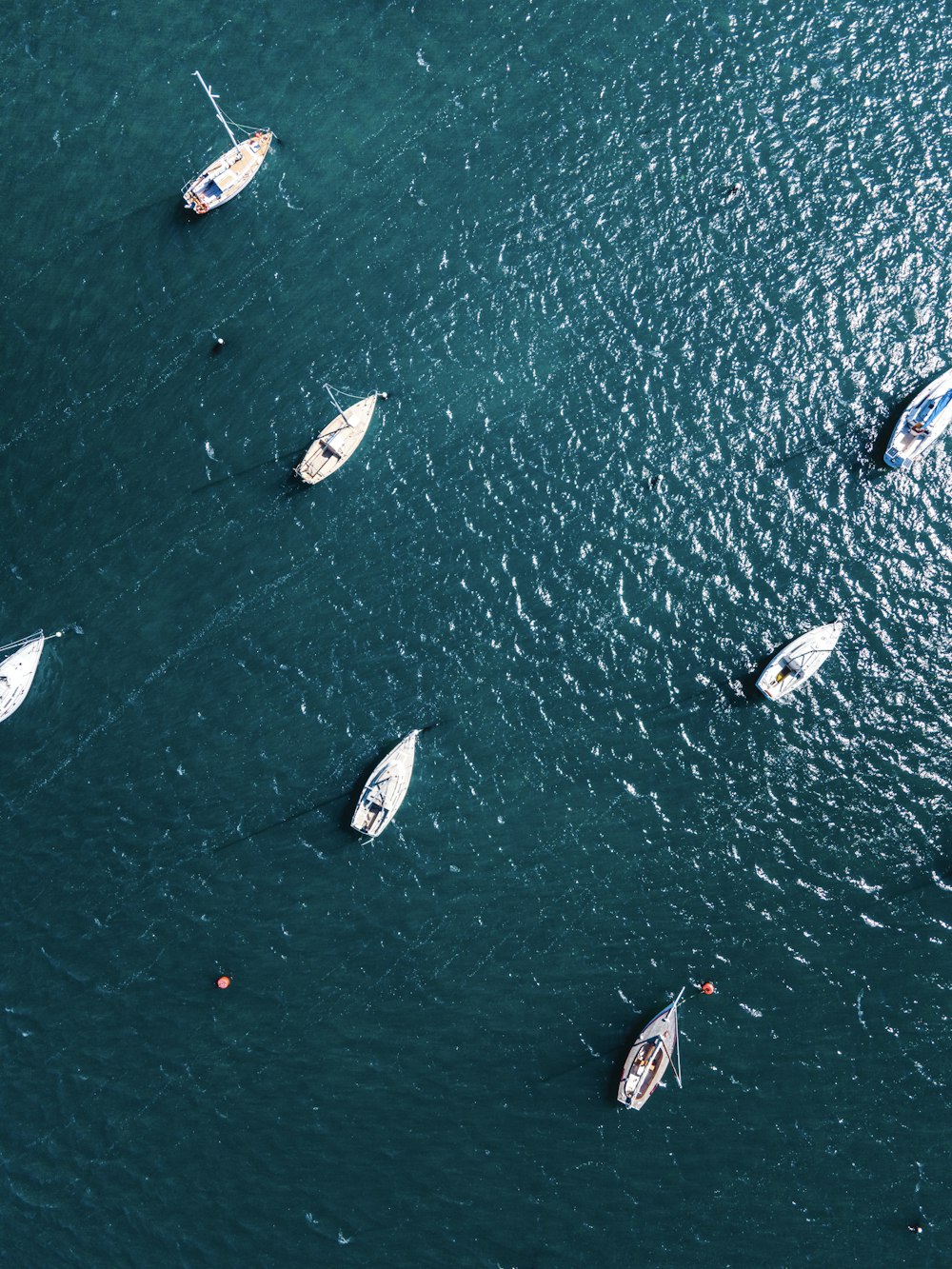 aerial view of boats on sea during daytime