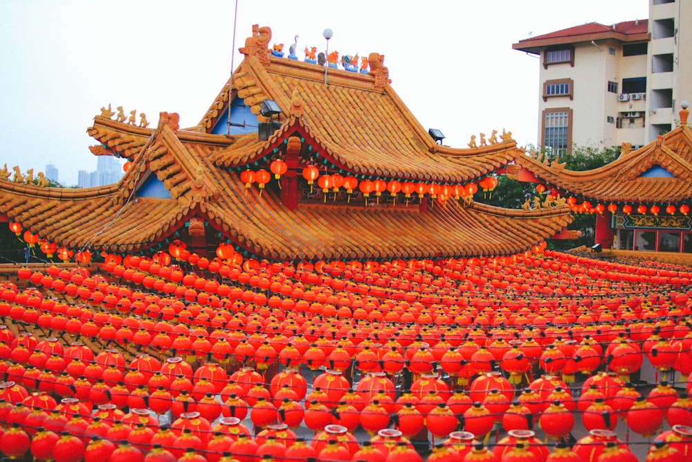 red and brown temple under white sky during daytime