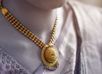 A close-up of a handcrafted necklace with intricate details.