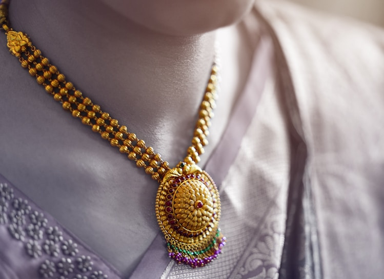 Close-up of a handmade vintage necklace with intricate details.
