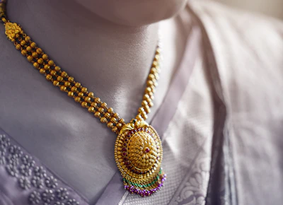 Gold pendant necklace with delicate chain