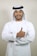 A happy customer, Ali Khan, giving a thumbs up.