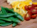 Close-up of a chef inspecting fresh produce delivered in perfect condition.