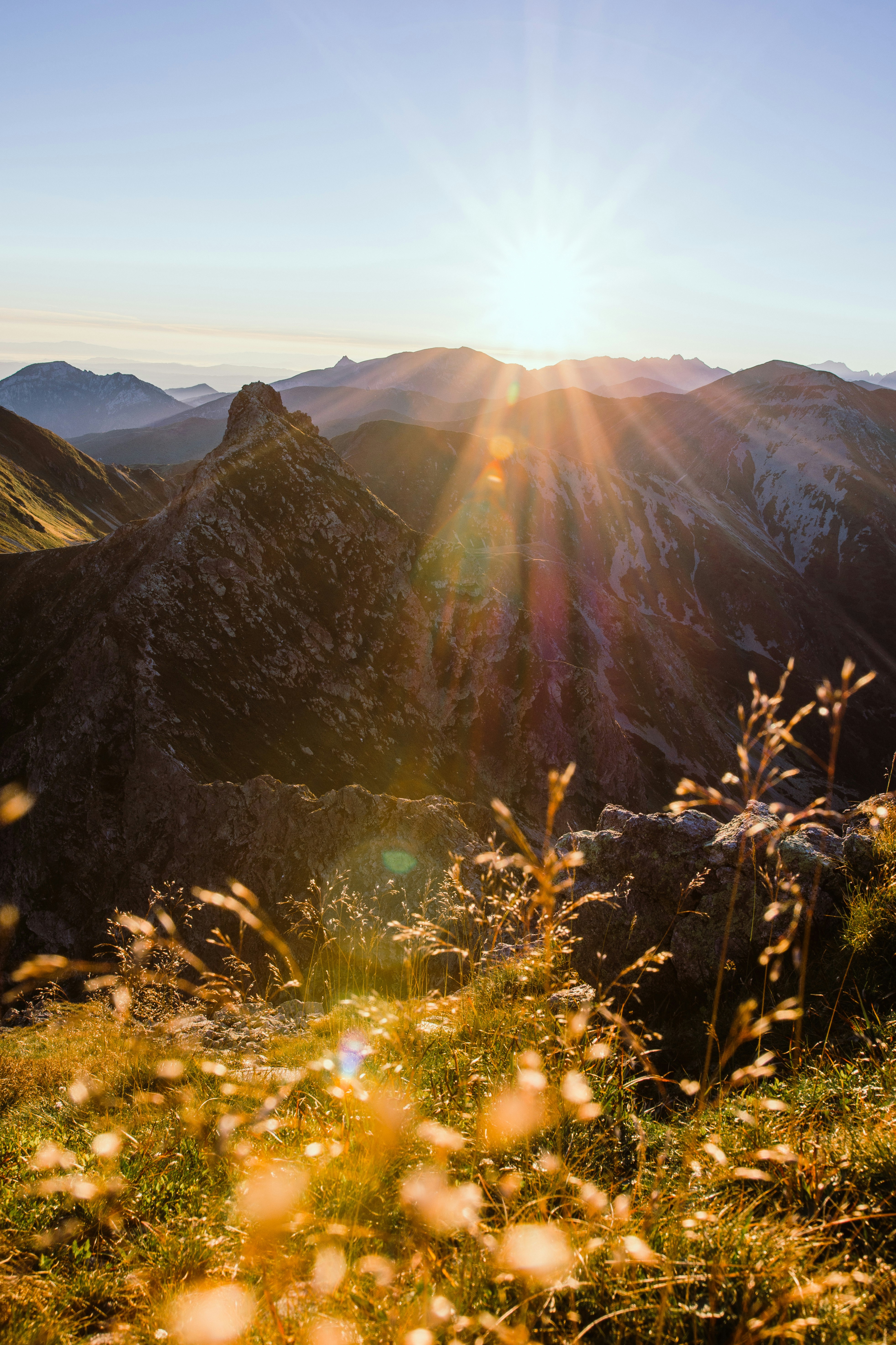 green and brown mountain under white sky during daytime