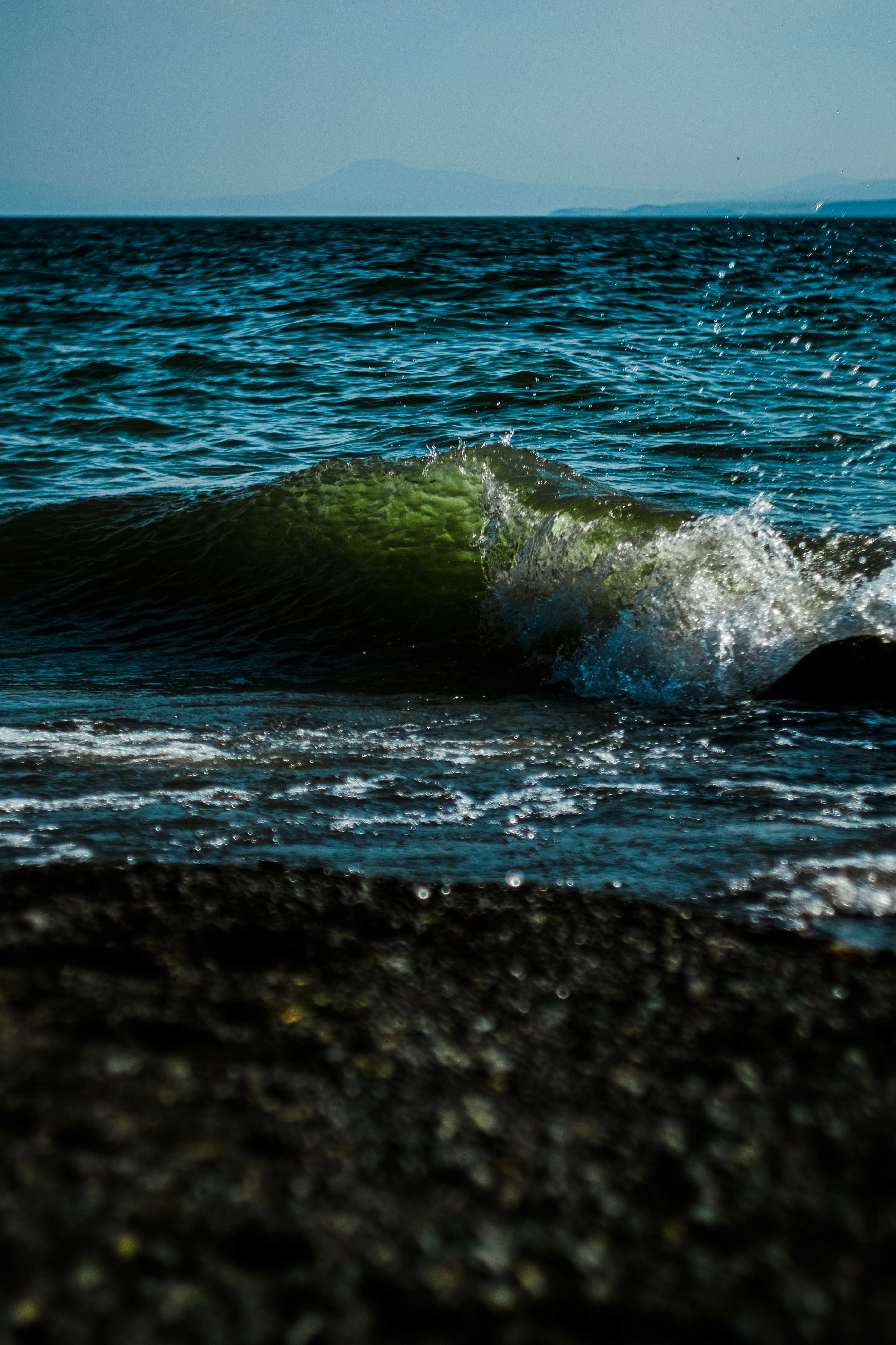 water waves on black rock