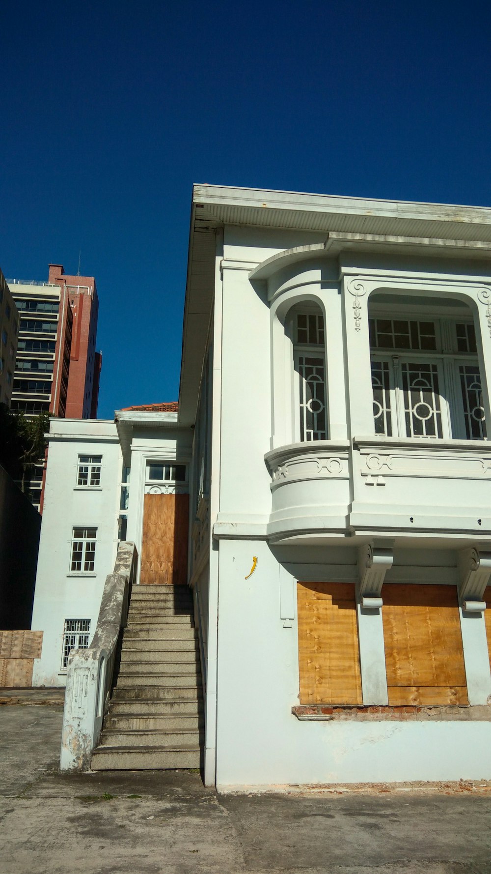 white and brown concrete building under blue sky during daytime