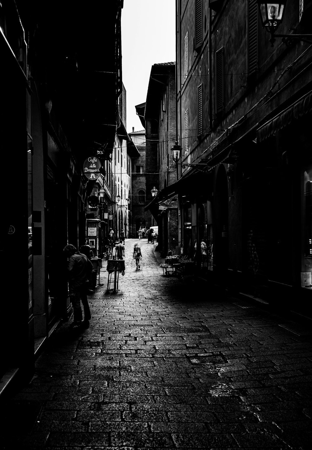 grayscale photo of people walking on street