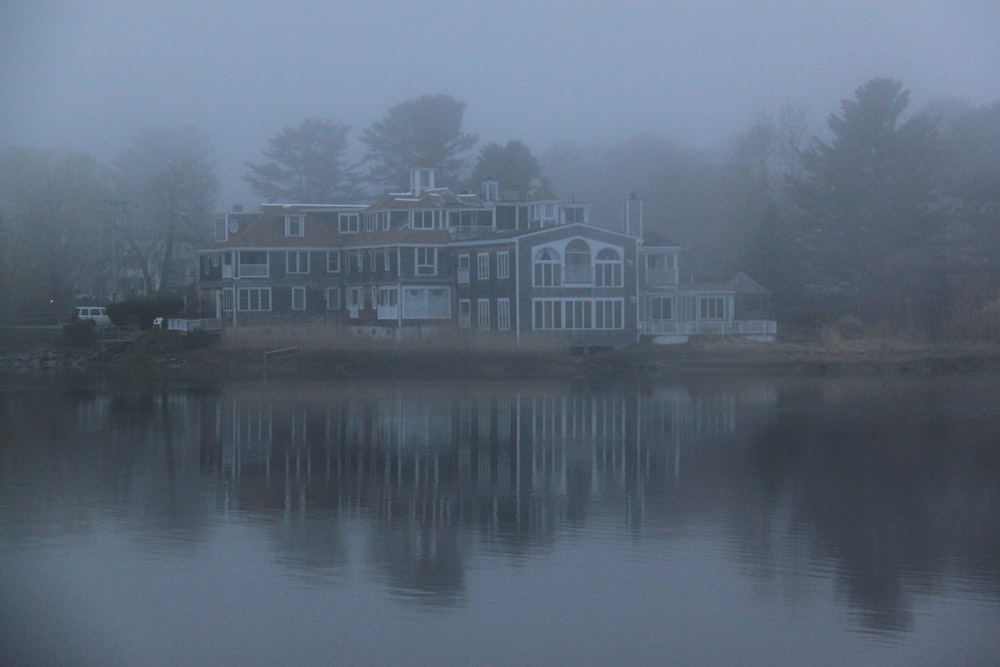 white building near body of water