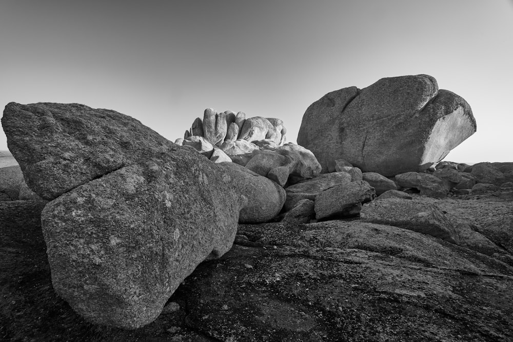 gray scale photo of rock formation