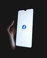 A dynamic Facebook content video playing on a smartphone screen with vibrant visuals.