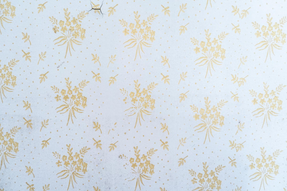 white and brown floral textile