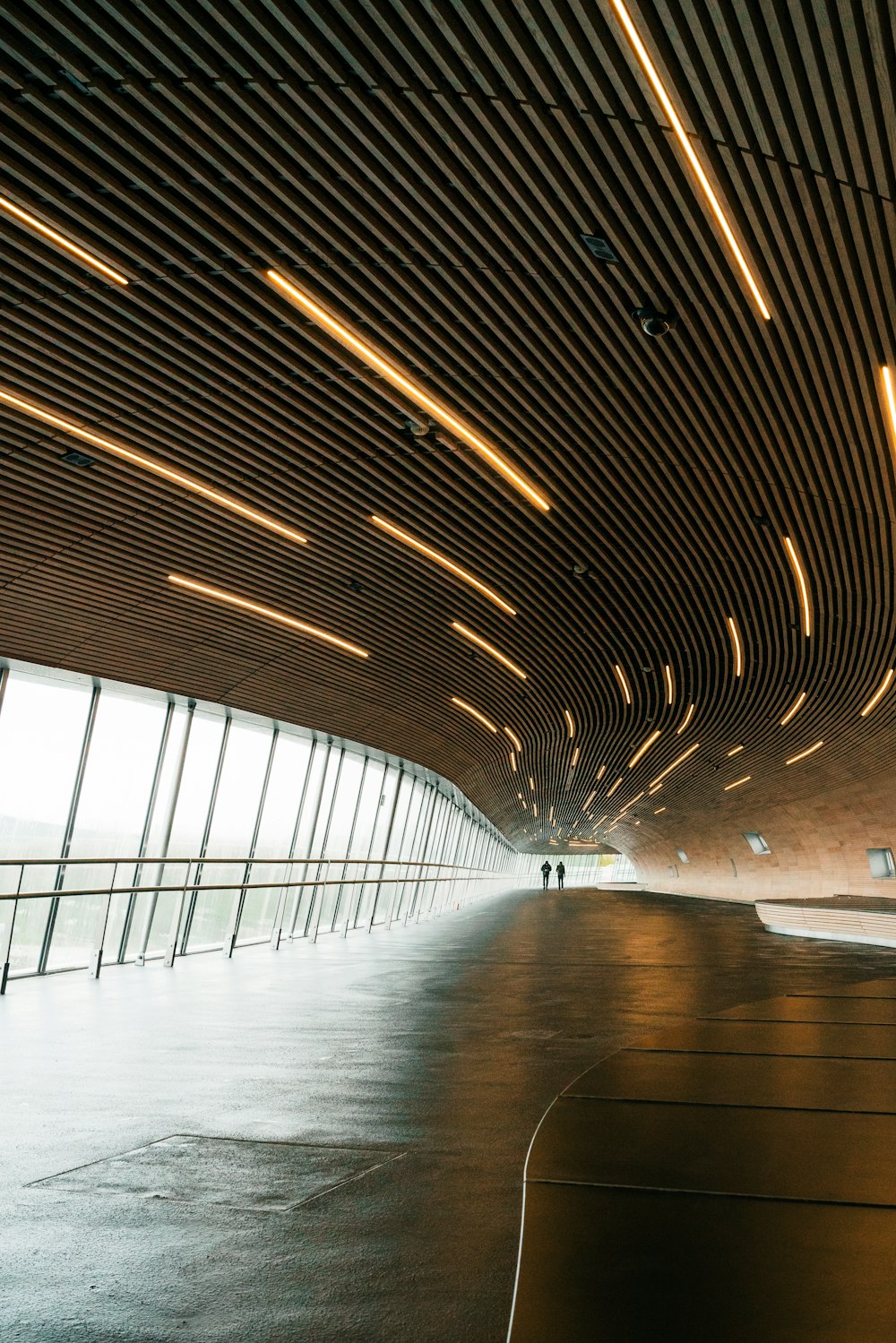 people walking on a tunnel