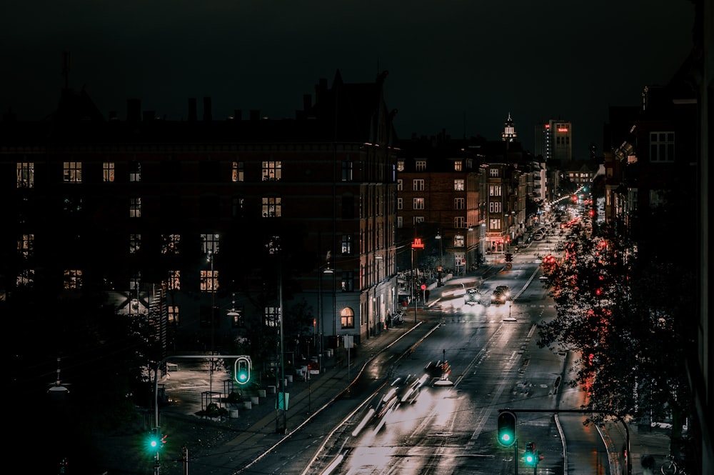 cars on road in city during night time