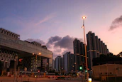 A vibrant cityscape at dusk highlighting infrastructure projects completed by Azer Engineering.