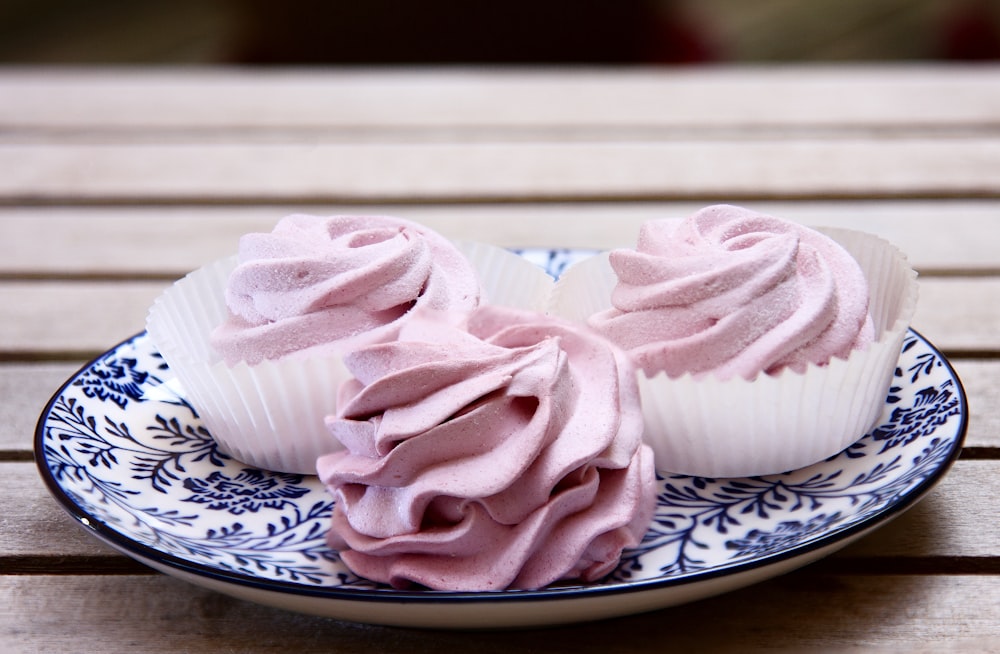 pink and white floral ceramic plate