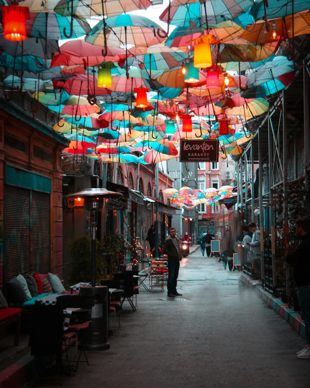 people walking on street during nighttime