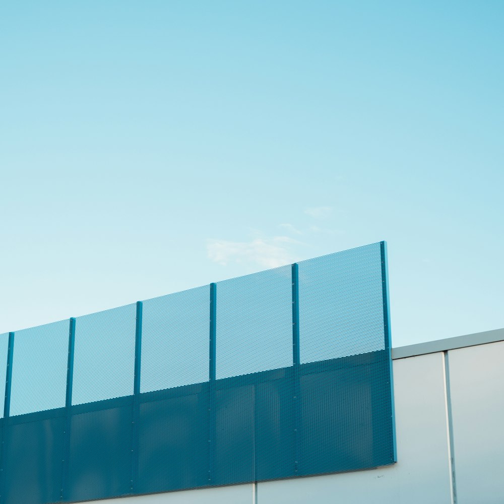 blue and white building under white sky during daytime