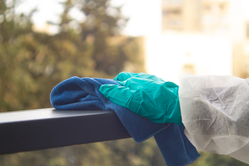Window washer reviewing schedule and checking off completed jobs