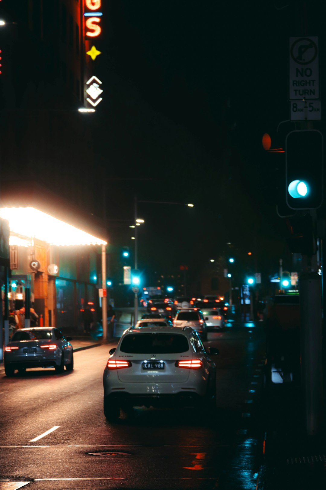 cars on road during night time