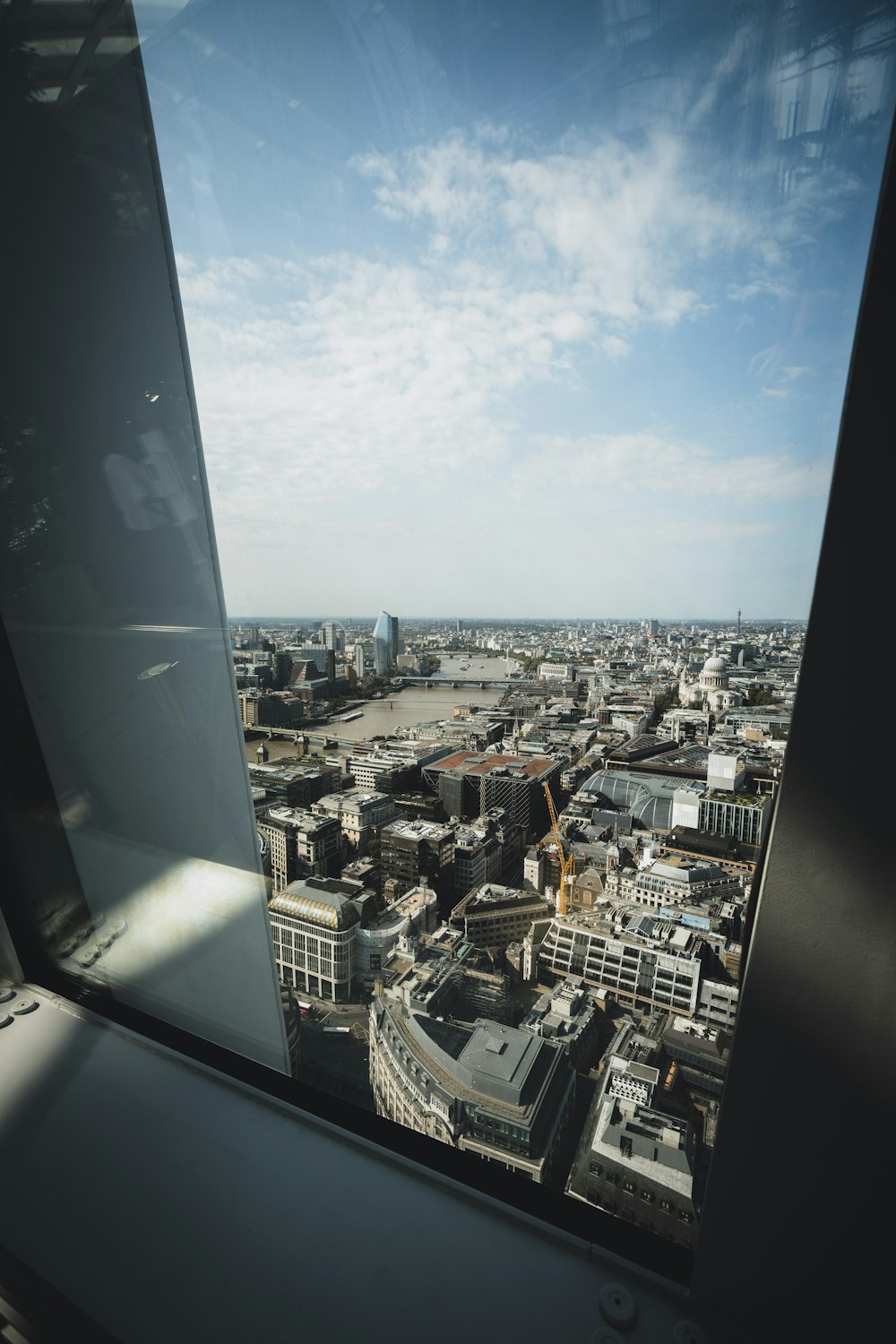 city buildings under blue sky during daytime