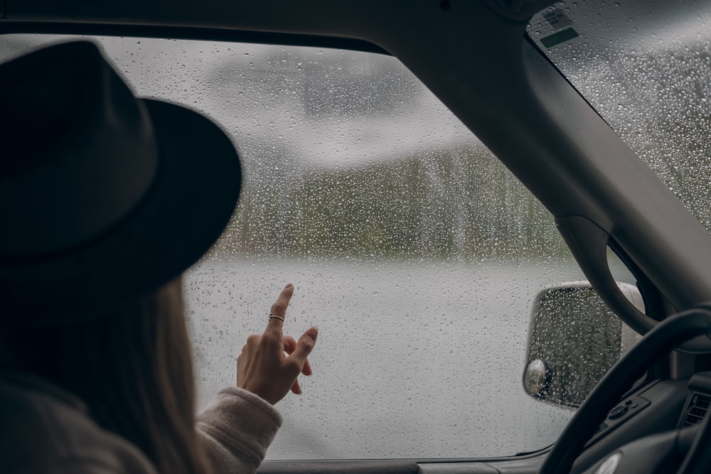 person in car during daytime