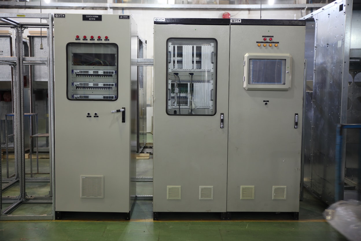 Control panel interior with DIN-rail remote I/O modules and HMI