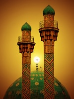 brown and green tower with light