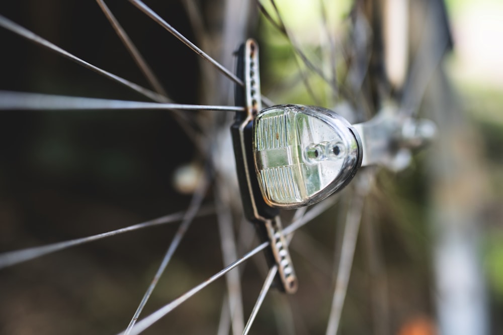 a close up of the spokes of a bicycle