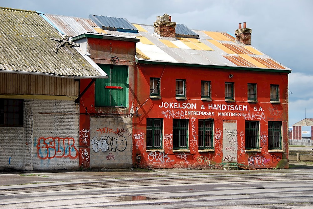 red and blue concrete building during daytime