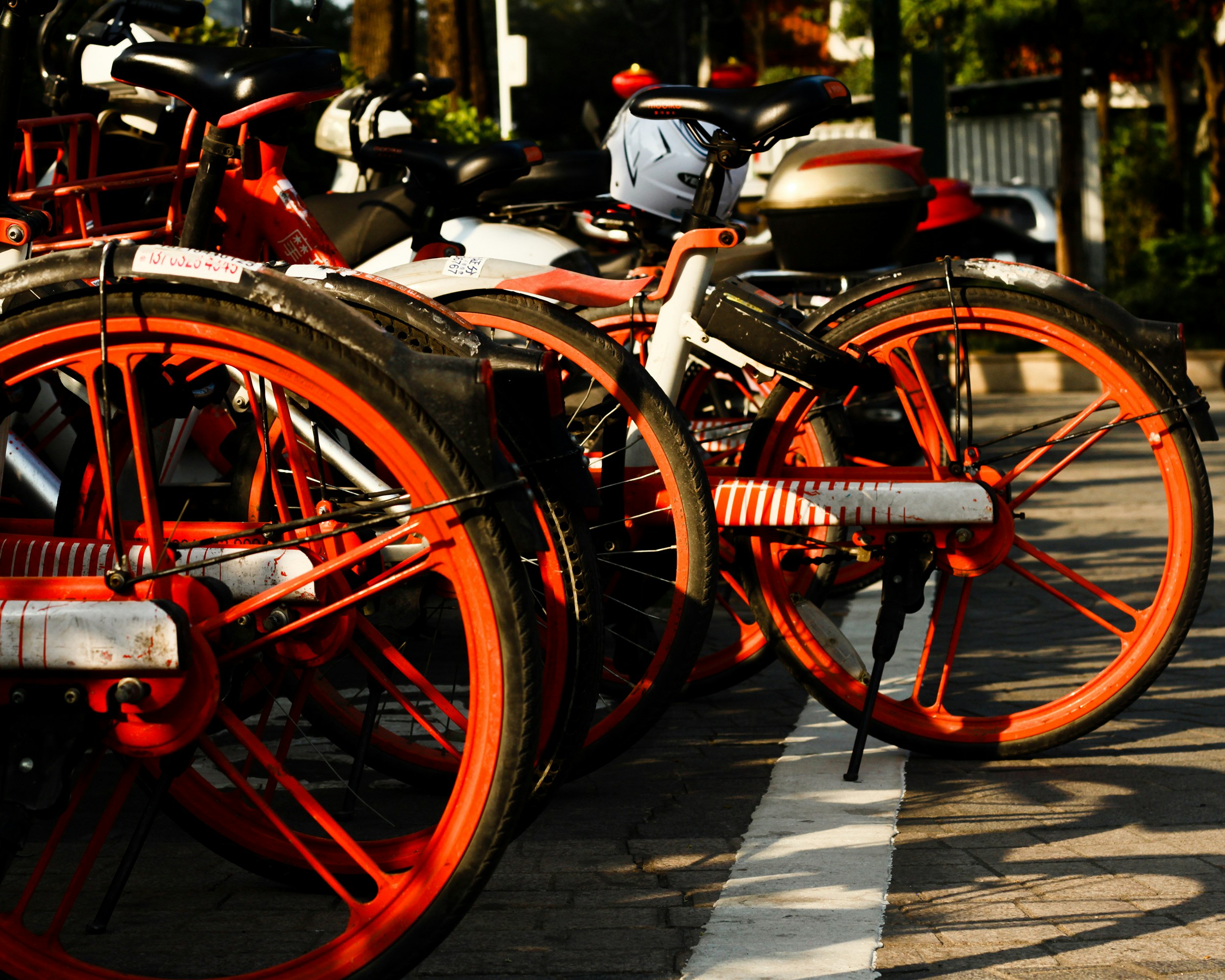 black and red bicycle on gray concrete floor wheel zoom background