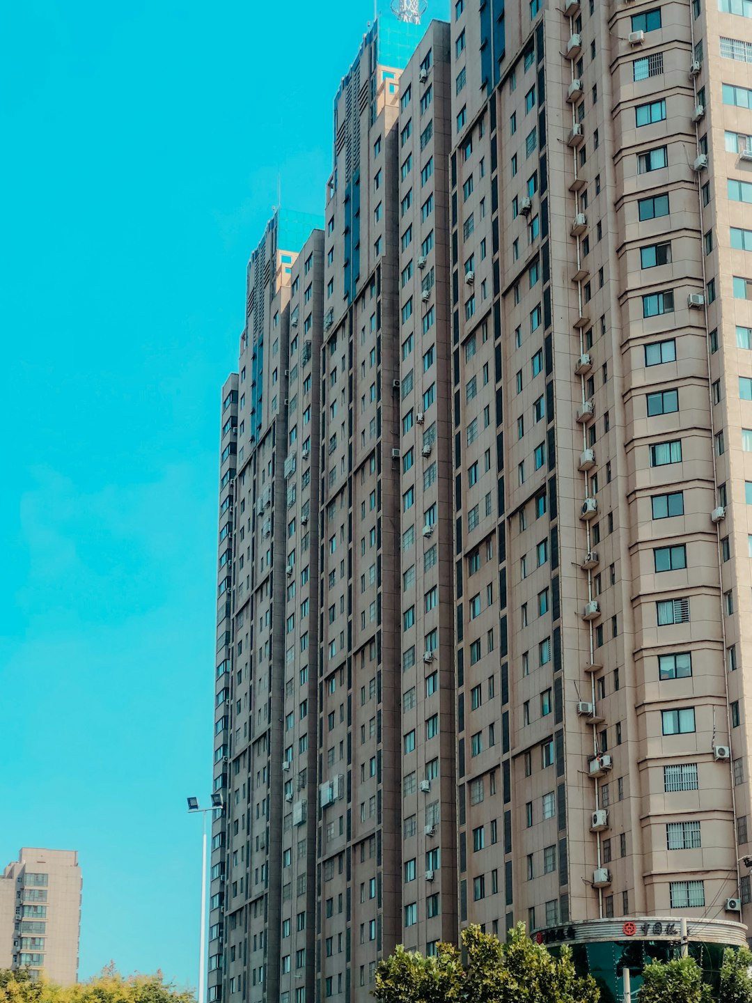 white and brown concrete building under blue sky during daytime