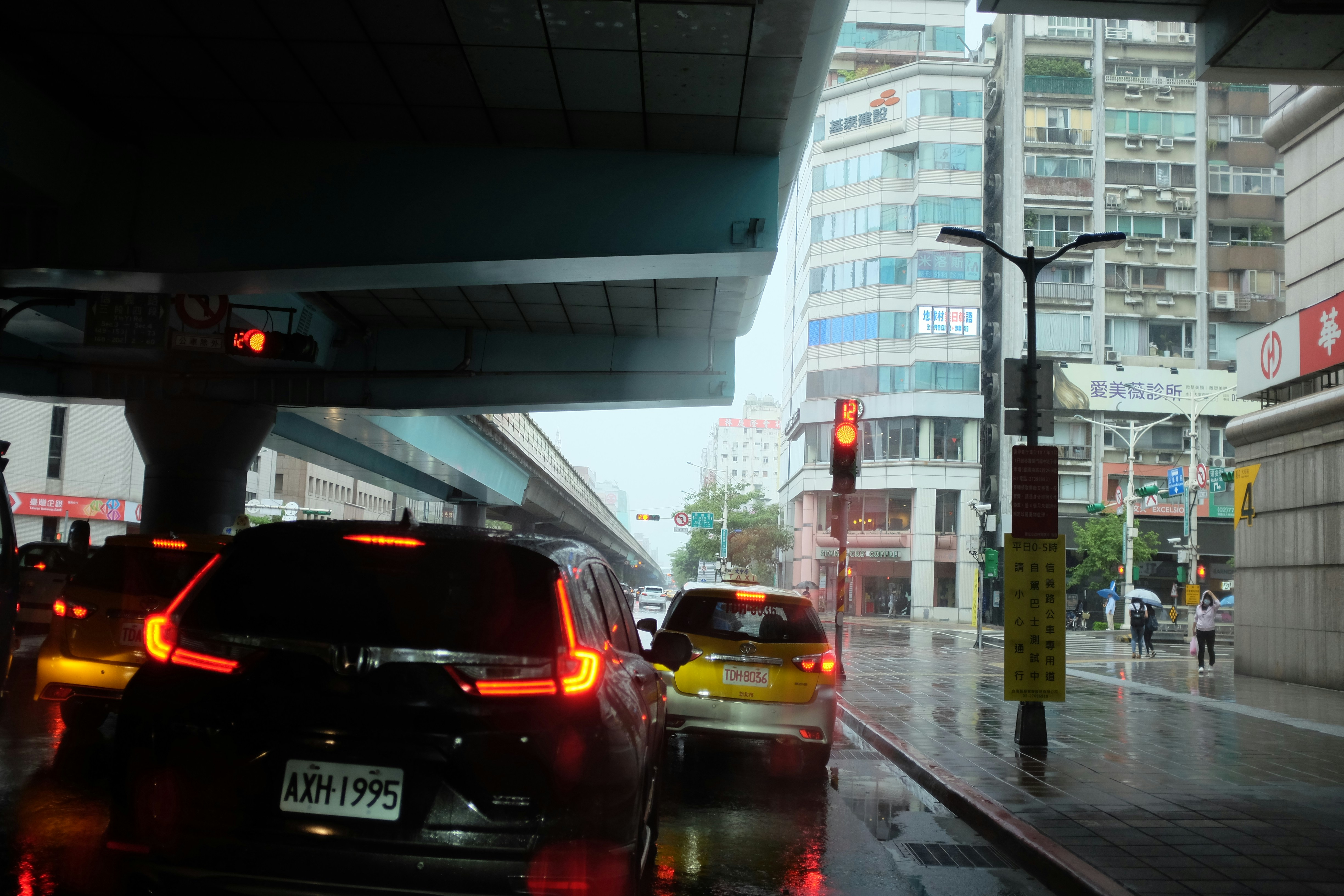 Electric car driving in city traffic where stop and go conditions maximize regenerative braking benefits