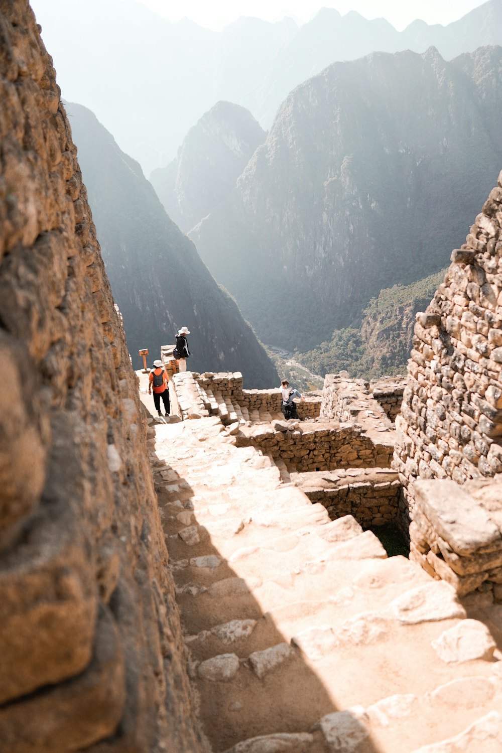 people walking on rocky mountain during daytime