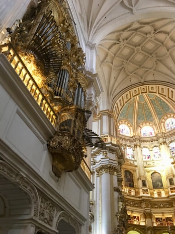 An imposing pipe organ in a vast cathedral, symbolizing the epic architecture in the music.