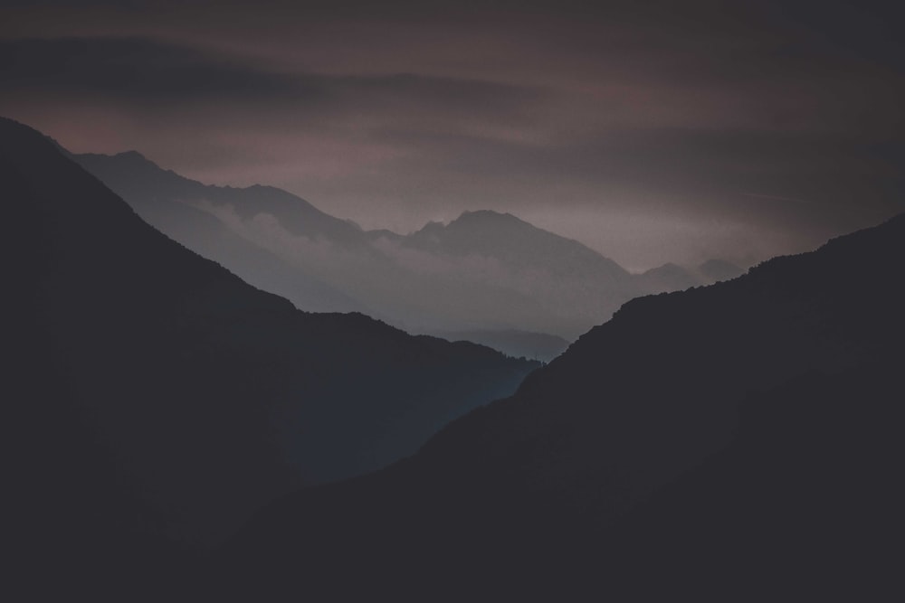 silhouette of mountains during daytime