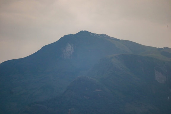 A serene, misty mountain landscape symbolizing spiritual calm and reflection.
