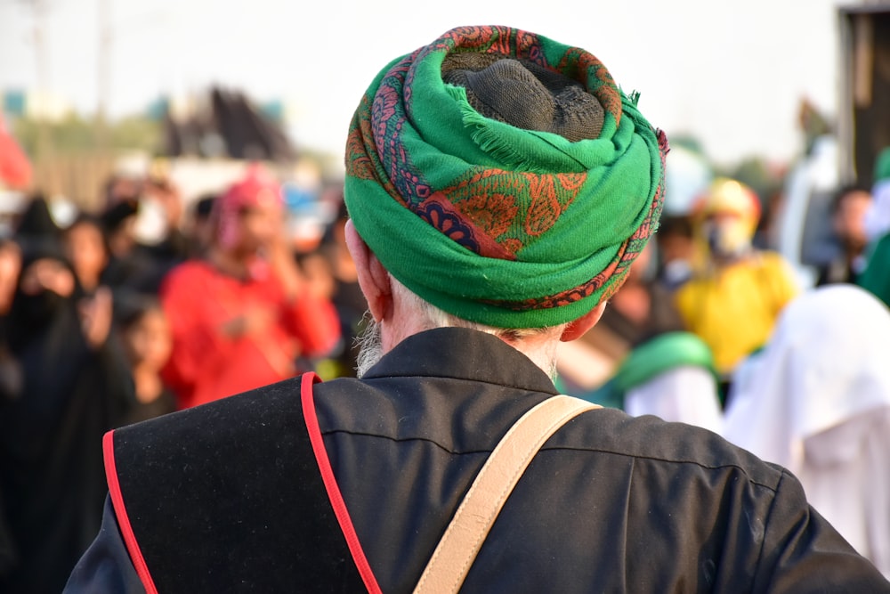 woman in green and black hijab