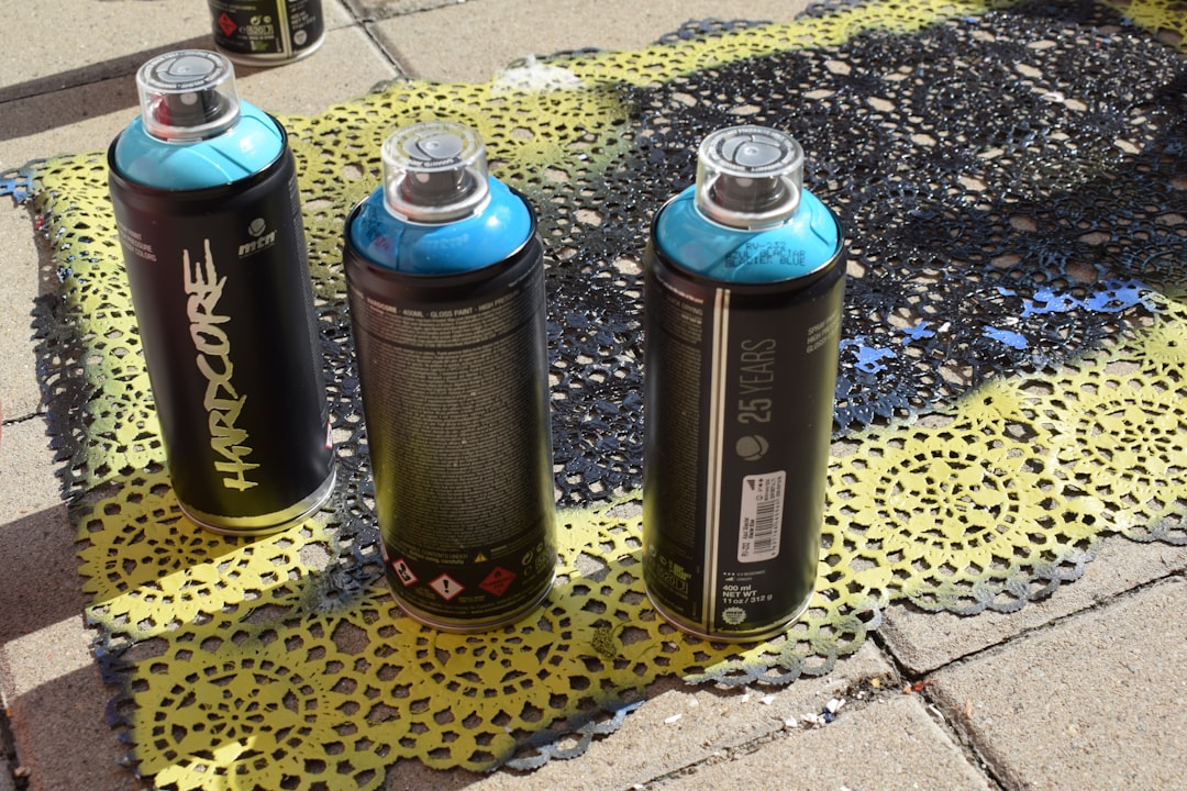 black and gray spray can