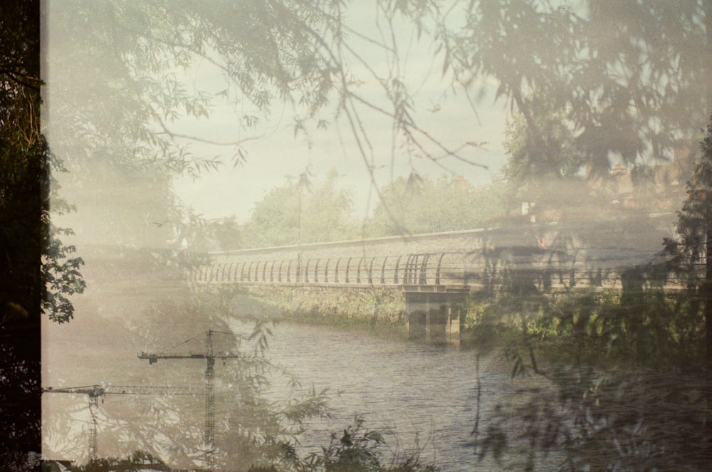 gray scale photo of bridge