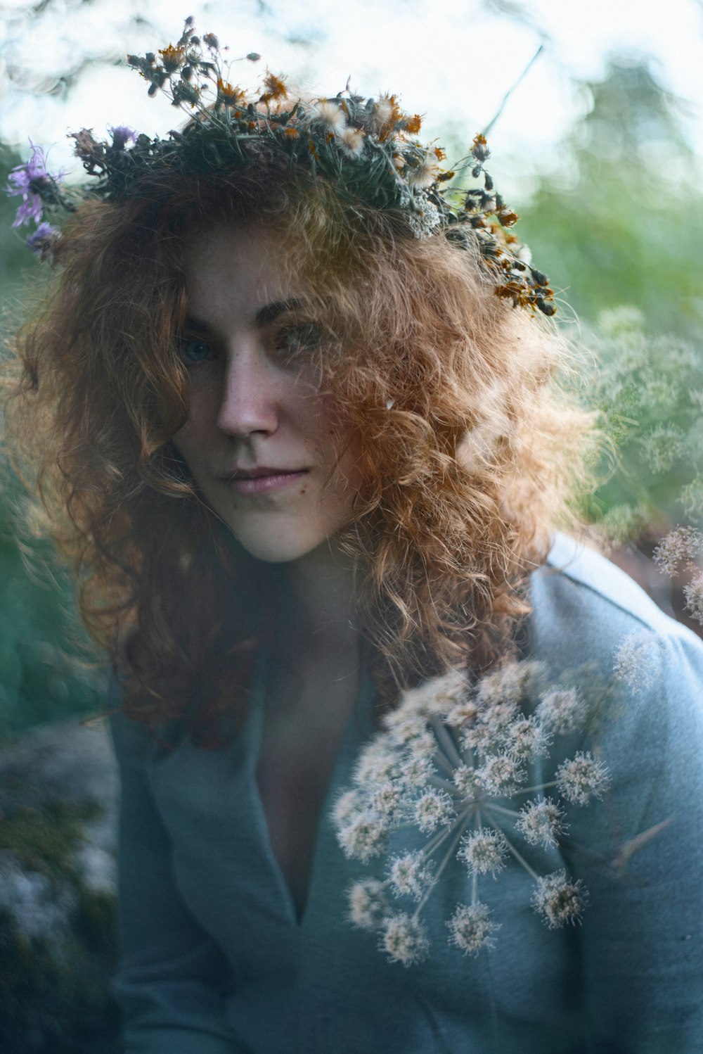 woman in white floral shirt