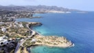 aerial view of green trees and blue sea during daytime