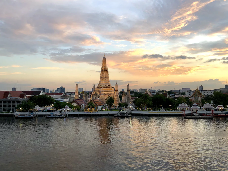 Travellers exploring a temple in Bangkok, Thailand