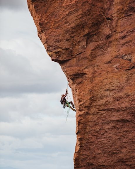 man climbing-about us -get lean muscle