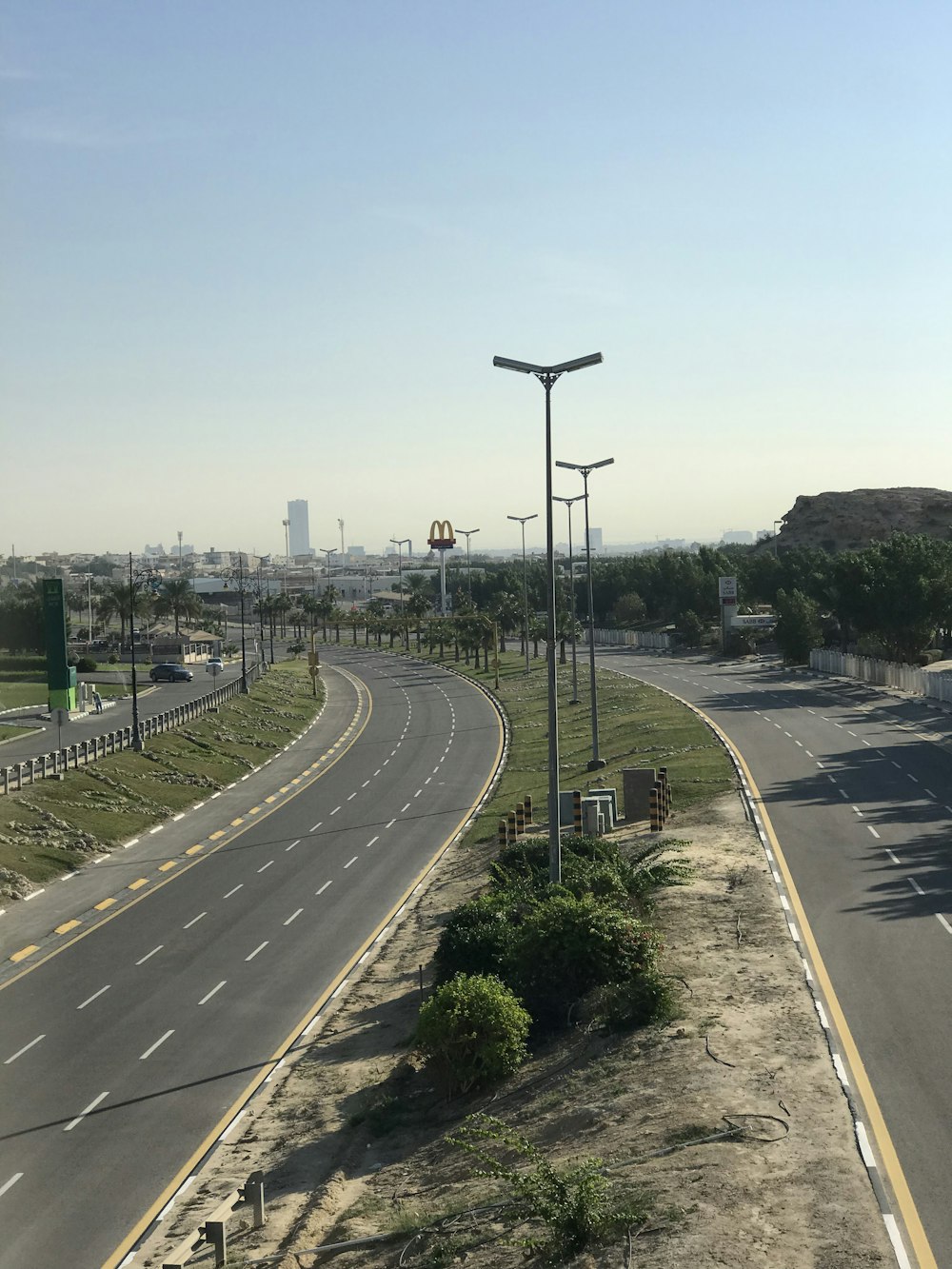 gray concrete road during daytime