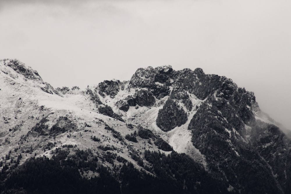 snow covered mountain during daytime